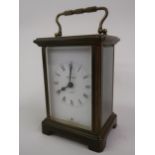 Small French brass cased single train carriage clock by Bayard, together with a cigarette