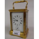 Small late 19th / early 20th Century gilt brass cased carriage clock, the enamel dial with Roman