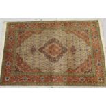 Small Indo-Persian rug with a lobed medallion and all over Herati design on a ivory ground with
