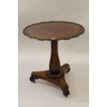 19th Century circular shaped top pedestal table, on faceted and baluster column and triform base,
