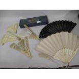 19th Century bone and silk fan, 10.5ins together with five other various small fans in a fabric