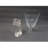 Kosta Boda glass candlestick, 8.5ins high, together with a large glass goblet and a stylised pottery