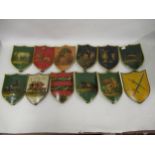 Group of twelve painted Toleware crests inscribed to the reverse with the Sons of Jacob and