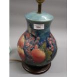 Large modern Moorcroft baluster form table lamp decorated with the Pomegranite design, 9ins tall