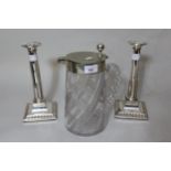 Good quality cut glass lemonade jug with silver plated mounts, together with a pair of silver