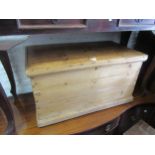 Small 19th Century stained pine trunk, with hinged cover, 31ins wide