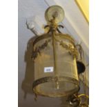 Mid 20th Century gilt brass circular lantern form light fitting with glass shade, 16ins high overall