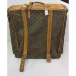 Louis Vuitton leather trimmed suit carrier, (some wear)