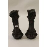 Pair of dark patinated and painted bronze vases in Art Nouveau style, decorated in high relief