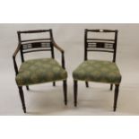 Set of six (four plus two) Regency mahogany dining chairs, the carved and reeded rail backs above