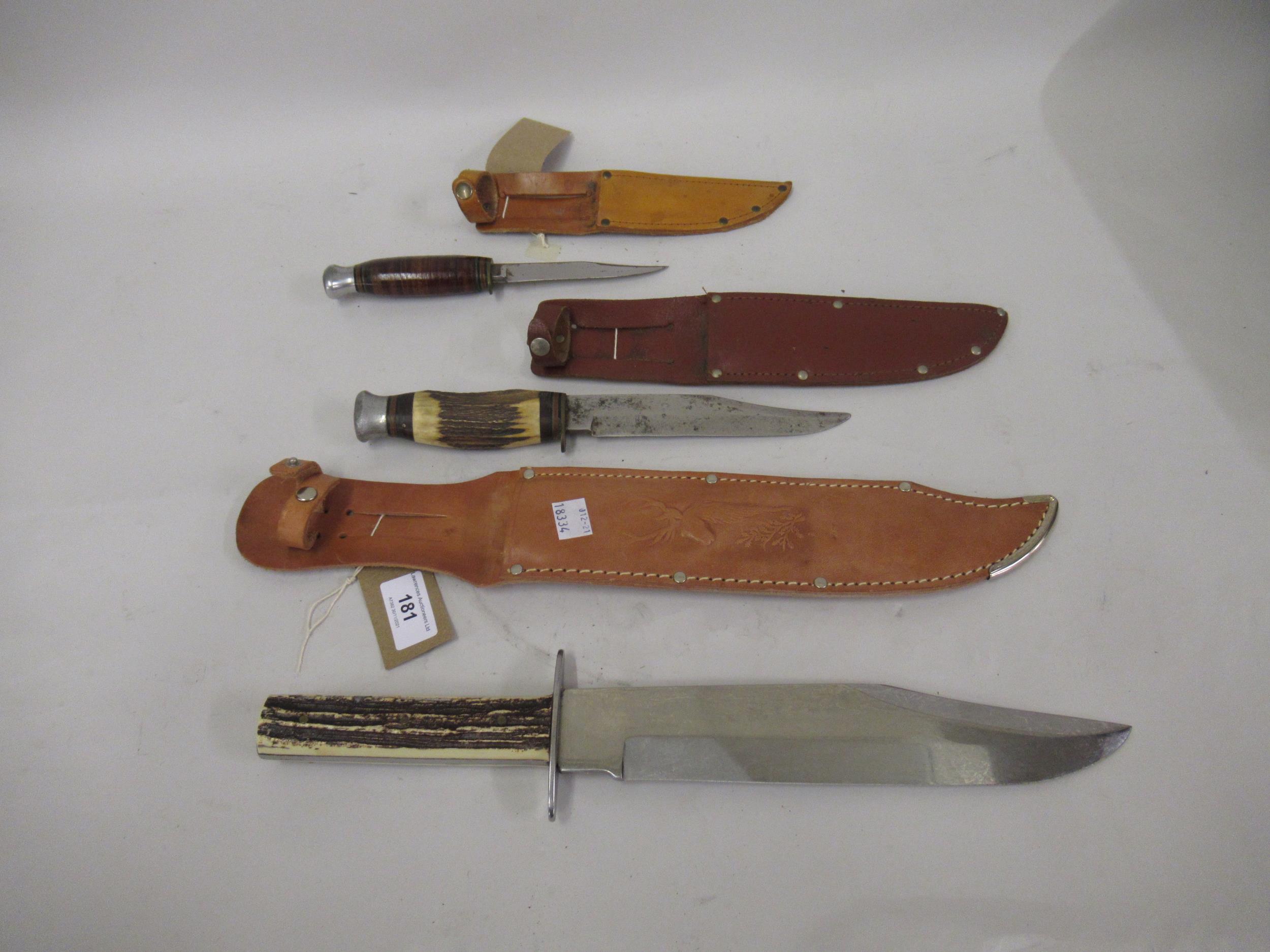 Bowie knife with simulated horn grip and leather sheath and two smaller earlier Bowie knives in