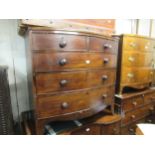 19th Century mahogany bow front chest of two short and three long drawers with knob handles and