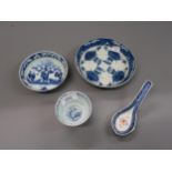 Chinese blue and white saucer dish decorated with figures beside a tree, 4.5ins diameter with four