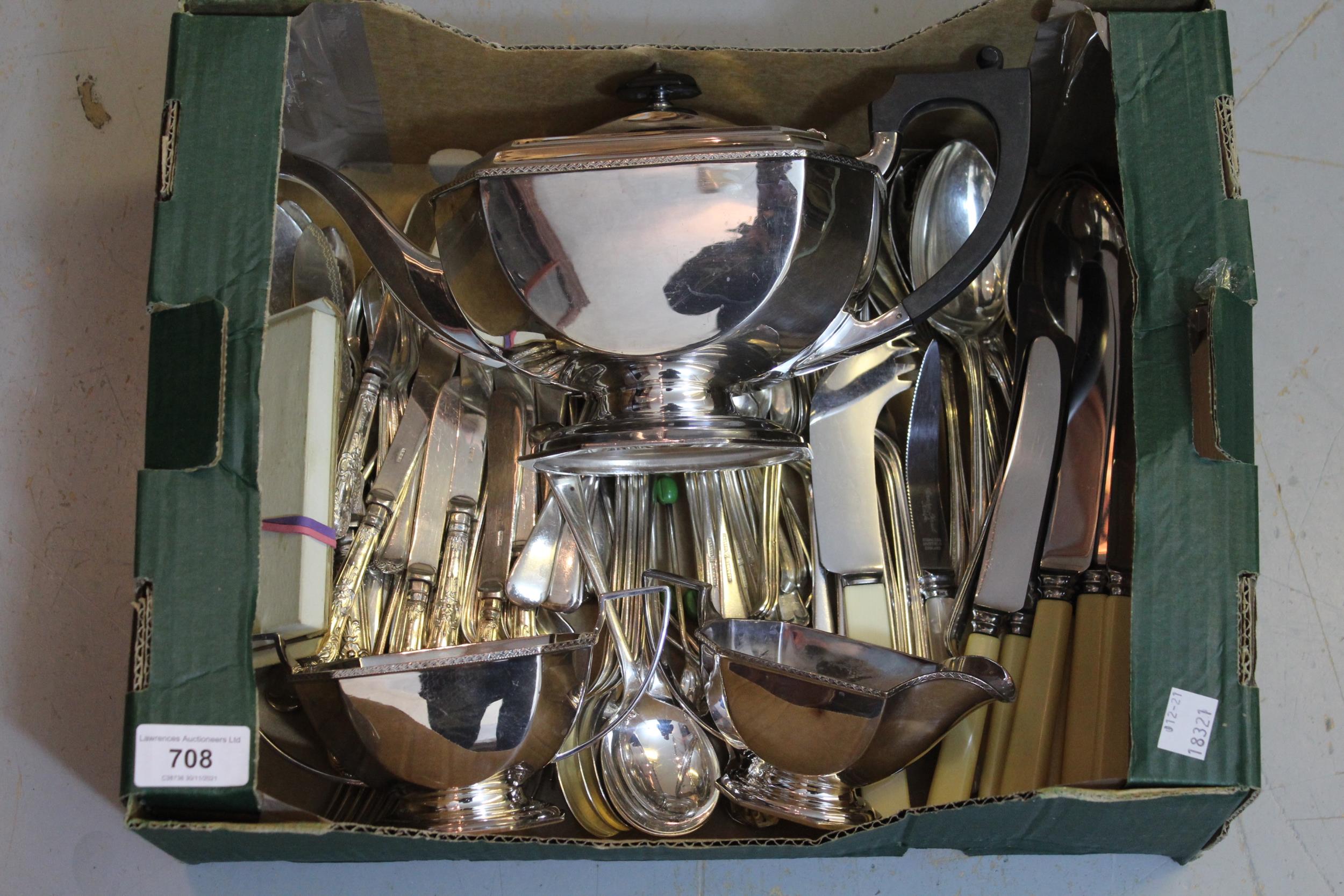 Three piece silver plated tea service together with a canteen of plated cutlery and other cutlery