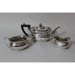 Early 20th Century silver three piece tea service, London 1913, 38 troy ounces