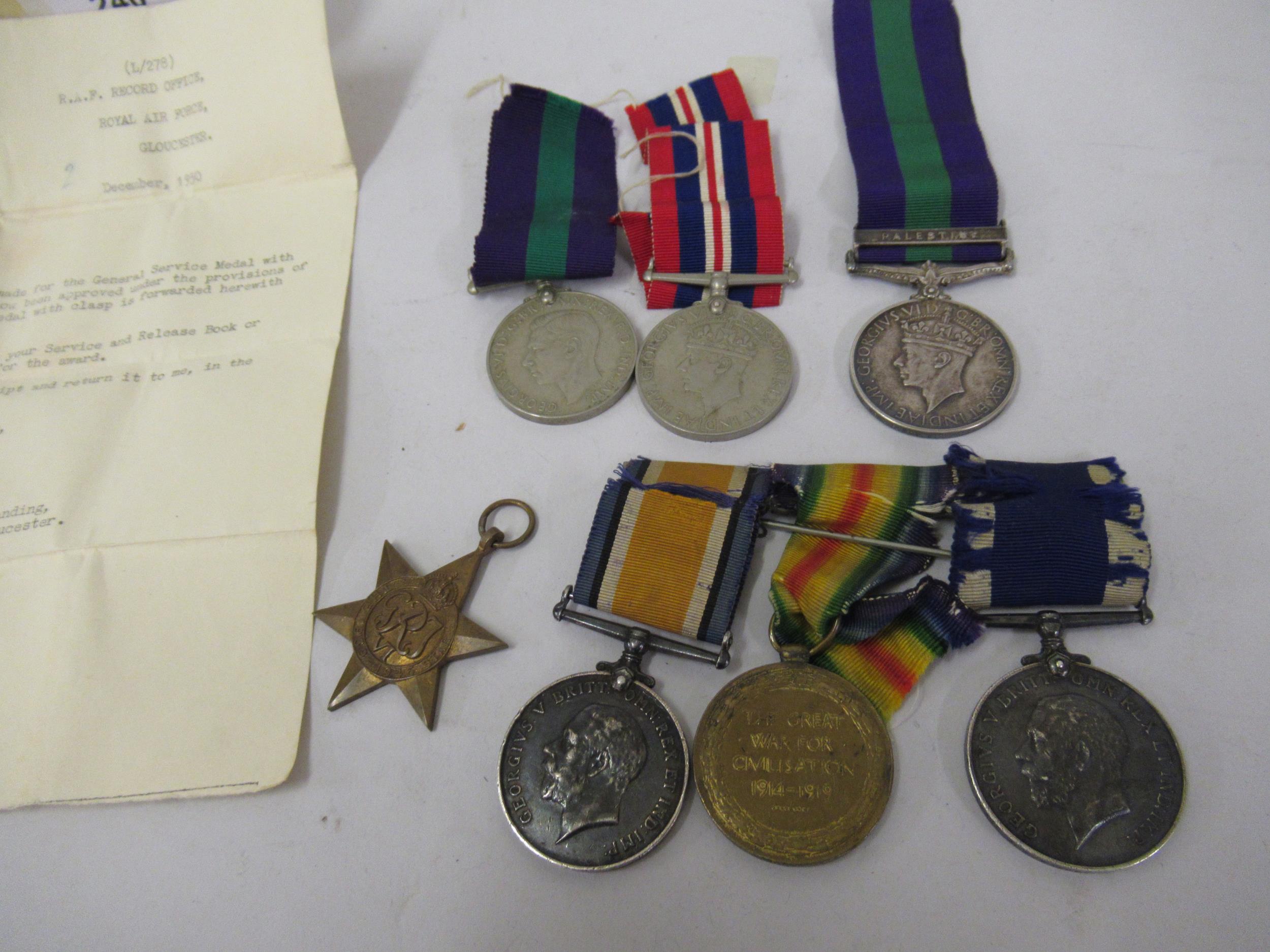 World War I three medal group, including long service and good conduct medal, awarded to E.W