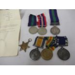 World War I three medal group, including long service and good conduct medal, awarded to E.W