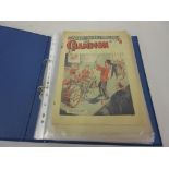 Quantity of 1950's ' The Champion ' comics, and two 1930's ' The Magnet ' comics, housed in an album
