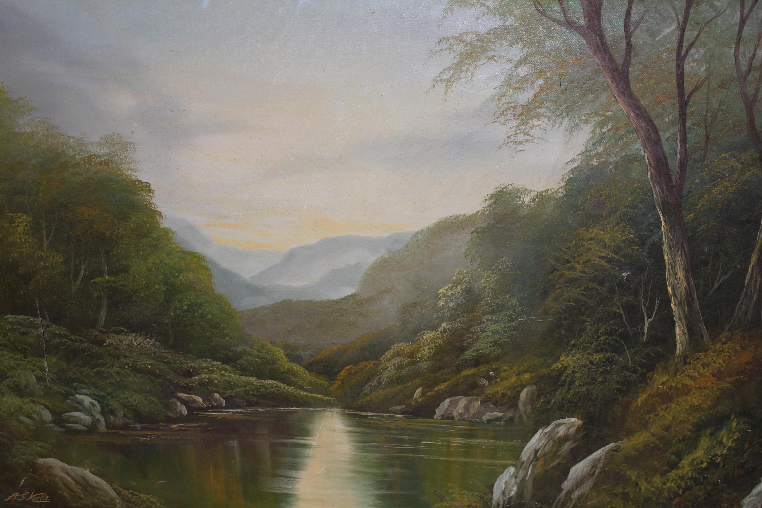 Andrew G. Kurtis, late 20th Century oil on canvas, wooded loch scene with distant mountains, signed,