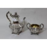 William IV London silver coffee pot with floral engraved and embossed decoration, dated 1835/36,