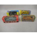 Group of four boxed Russian Vulgar diecast metal model vehicles