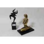 Small modern dark, patinated bronze figure of a dancing man on a polished marble base, 10ins high,