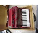 Children's piano accordion by Bell, in a fitted case