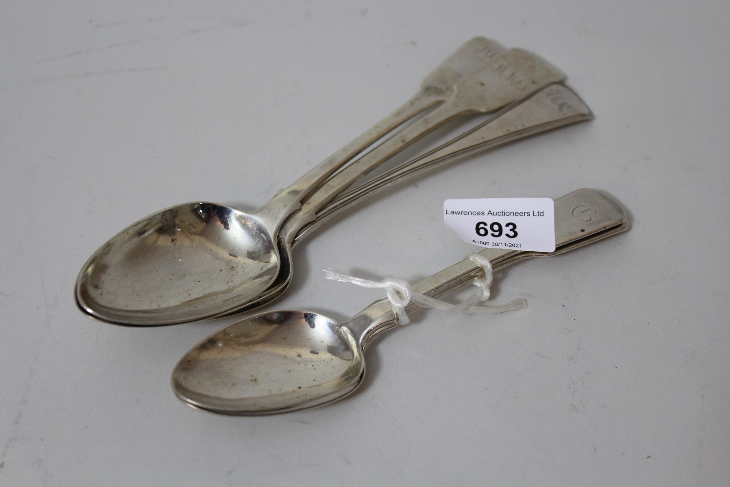 Two London silver Fiddle pattern tablespoons, a pair of Fiddle pattern dessert spoons and an Old