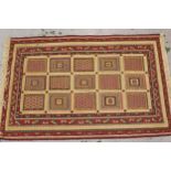 Small Soumak rug with an all over panelled and part piled design, with borders, 5ft 2ins x 3ft