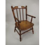 19th Century stained beech doll's elbow chair on turned supports