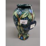 Moorcroft Limited Edition baluster form vase, decorated with a typical stylised floral design by