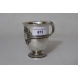 Small silver baluster form Christening mug with scroll handle and pedestal base, London 1912, 5.5oz