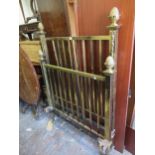 Good quality Edwardian gilt brass single bedstead with pineapple finials, 44ins wide