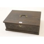 19th Century carved oak Bible box with hinged lid and brass carrying handle, 19ins wide