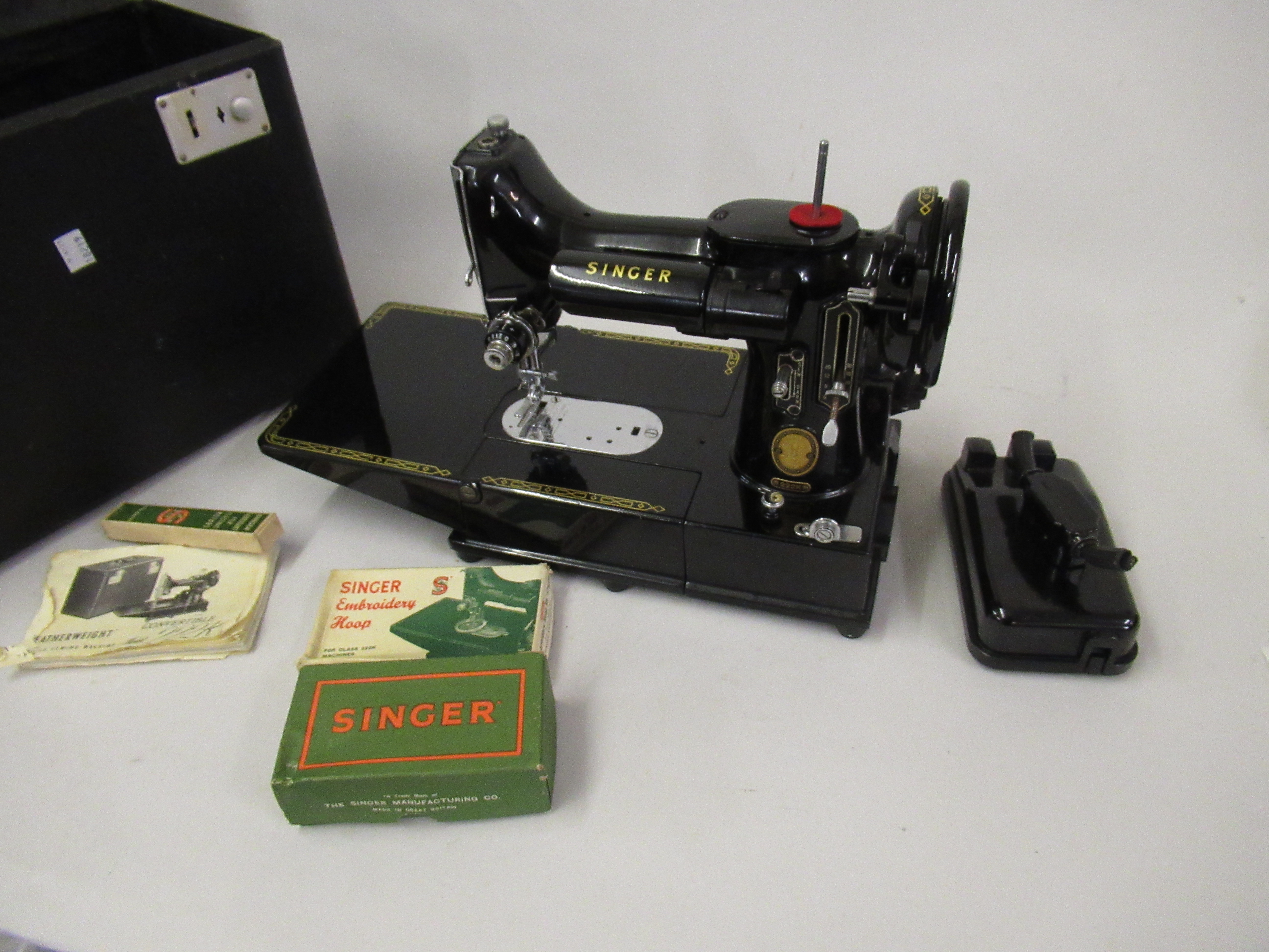 Singer Featherweight sewing machine, model CAK7-12, in original fitted case with accessories