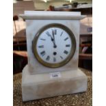 Late Victorian white marble mantel clock, the enamel dial with Roman numerals, with a single train