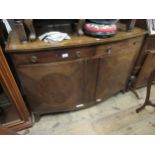 Late 19th / early 20th century mahogany bow fronted side cabinet, having line laid top above two