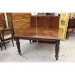 19th Century mahogany extending dining table, the moulded top with a shallow frieze, raised on