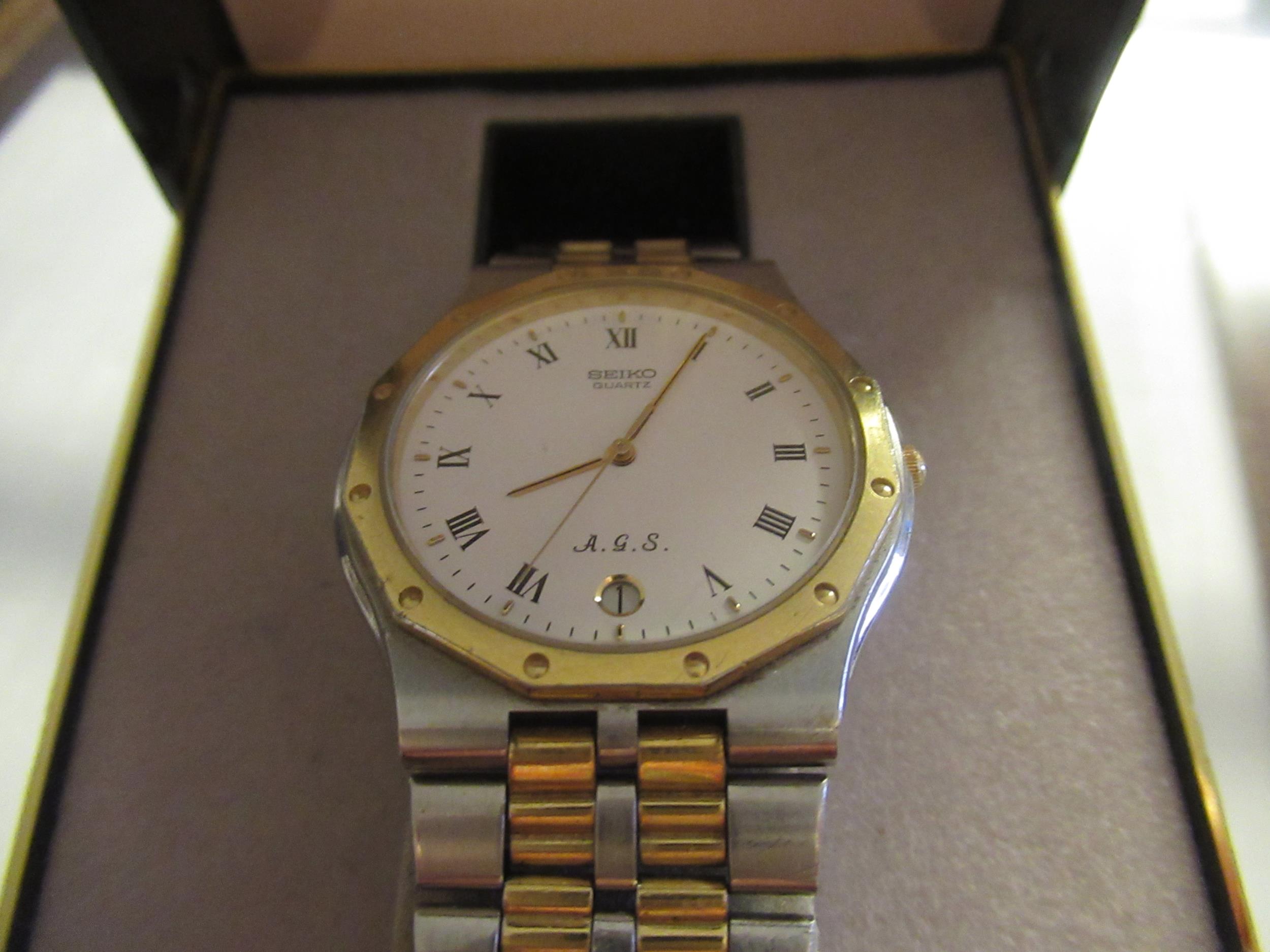 Gentleman's Seiko quartz bi-metal wristwatch still in original box. This was the first self