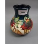 Modern Moorcroft baluster form vase decorated with typical stylised floral design, dated 1998, 6.