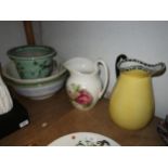 Two early 20th Century water jugs, three various wash basins and a jardiniere