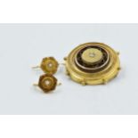 Victorian circular gold brooch set with a rose cut diamond, together with a pair of similar