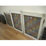 Three 20th Century white painted framed leaded coloured glass panels of differing sizes, 2 No. 17ins