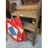 Pair of wooden iron mounted oak steps and a pair of painted imitation shields