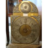 18th Century French oak longcase clock, with an arched hood above a carved panel door and plinth