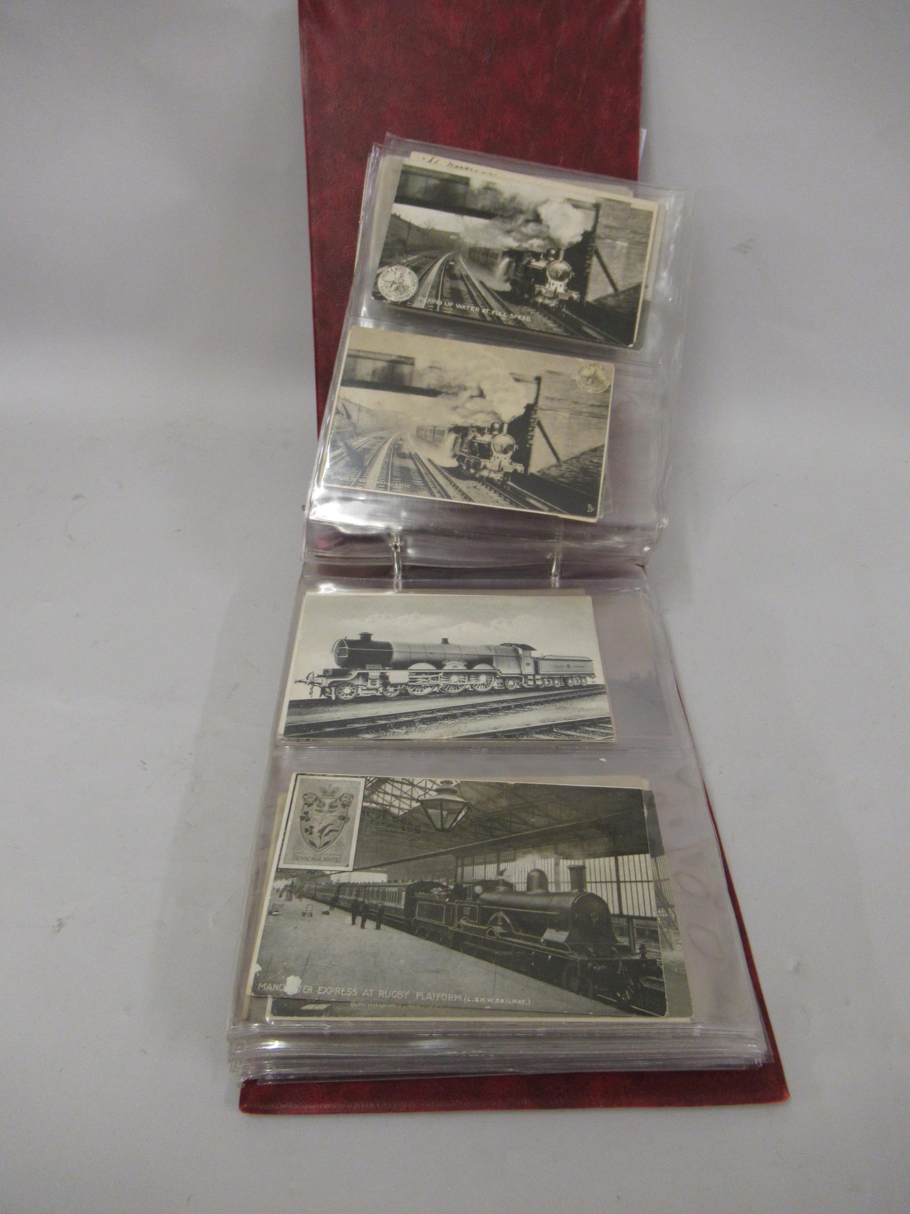 Album containing a collection of steam locomotive related post cards