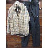 Ladies Burberry waterproof golf jacket and a pair of matching Burberry waterproof golf trousers (