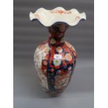 Large 19th Century Imari vase with a shaped rim and baluster body, 24.5ins high