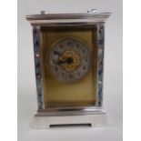 Small late 19th / early 20th Century silvered brass and champleve enamel decorated carriage clock,