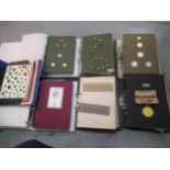 An extensive button collection presented in thirteen ring binders, including examples in Satsuma,